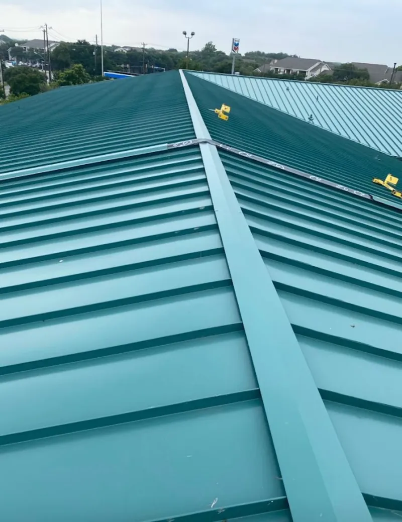 Green commercial metal roof ridge and valley for Metal Roof Repair in Millville