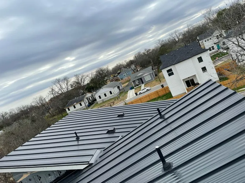 Standing seam metal roof panels with vents for Skylight Repair in Millville